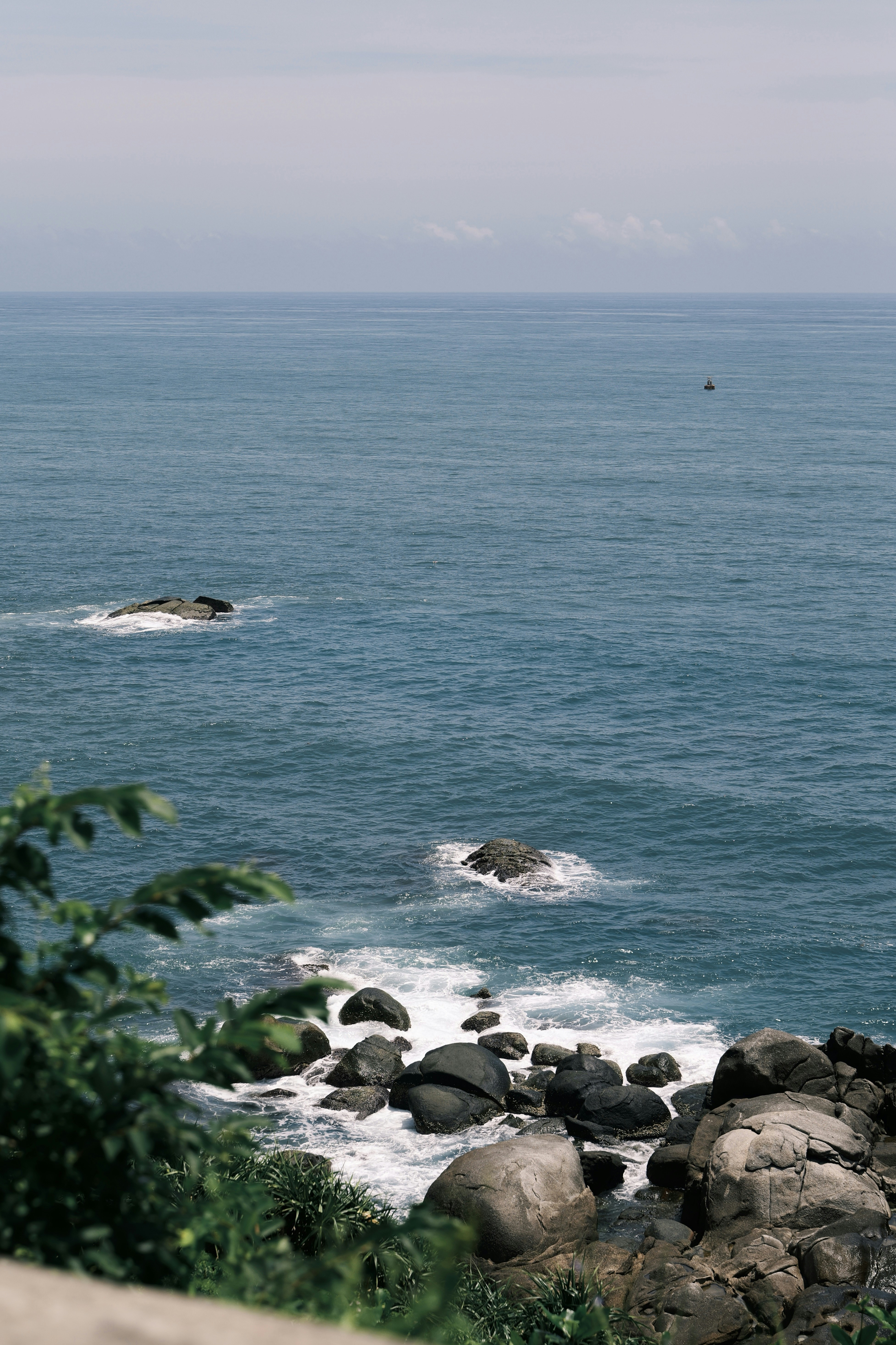A view of the ocean from a cliff