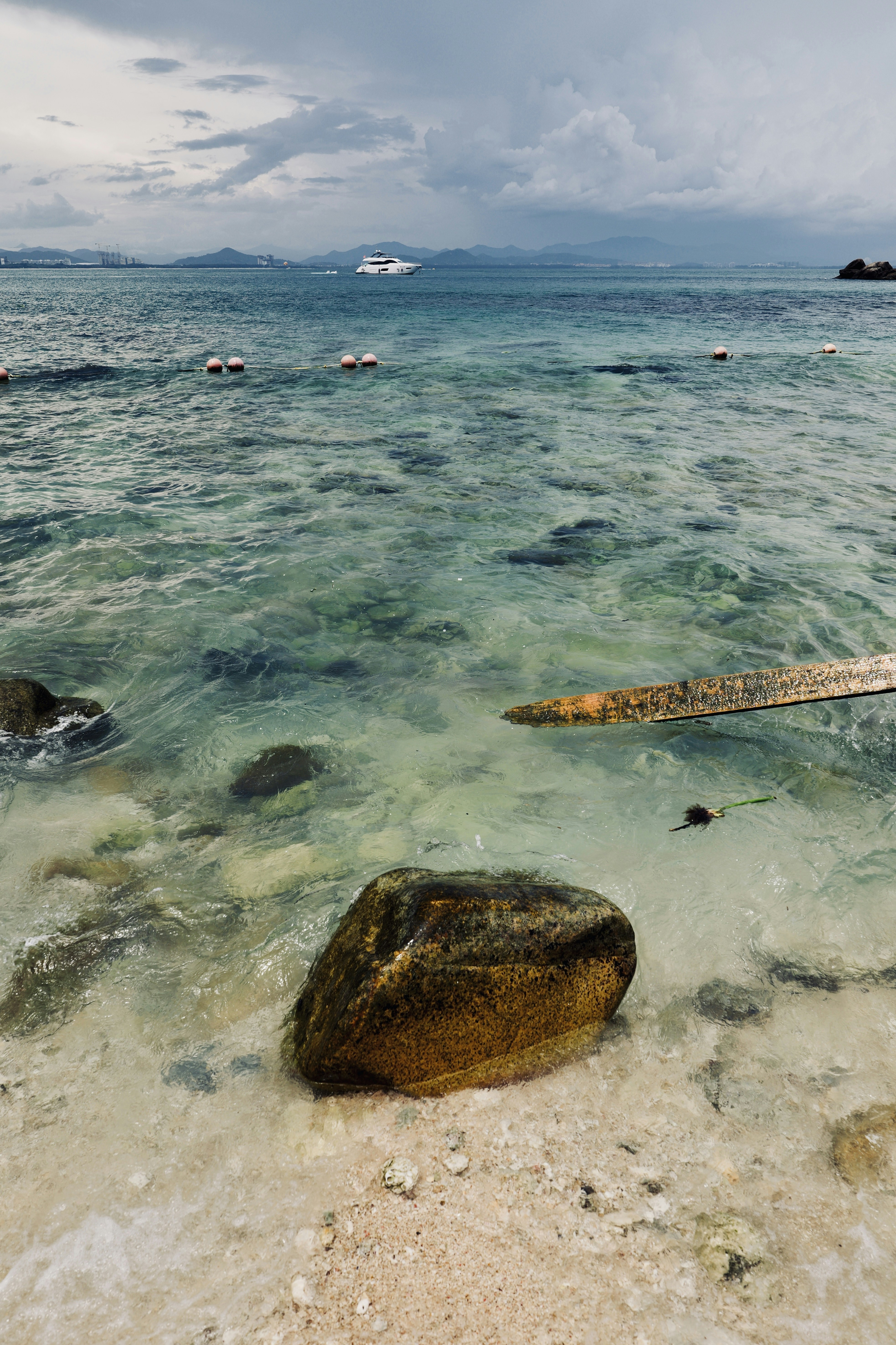 A body of water with rocks in it