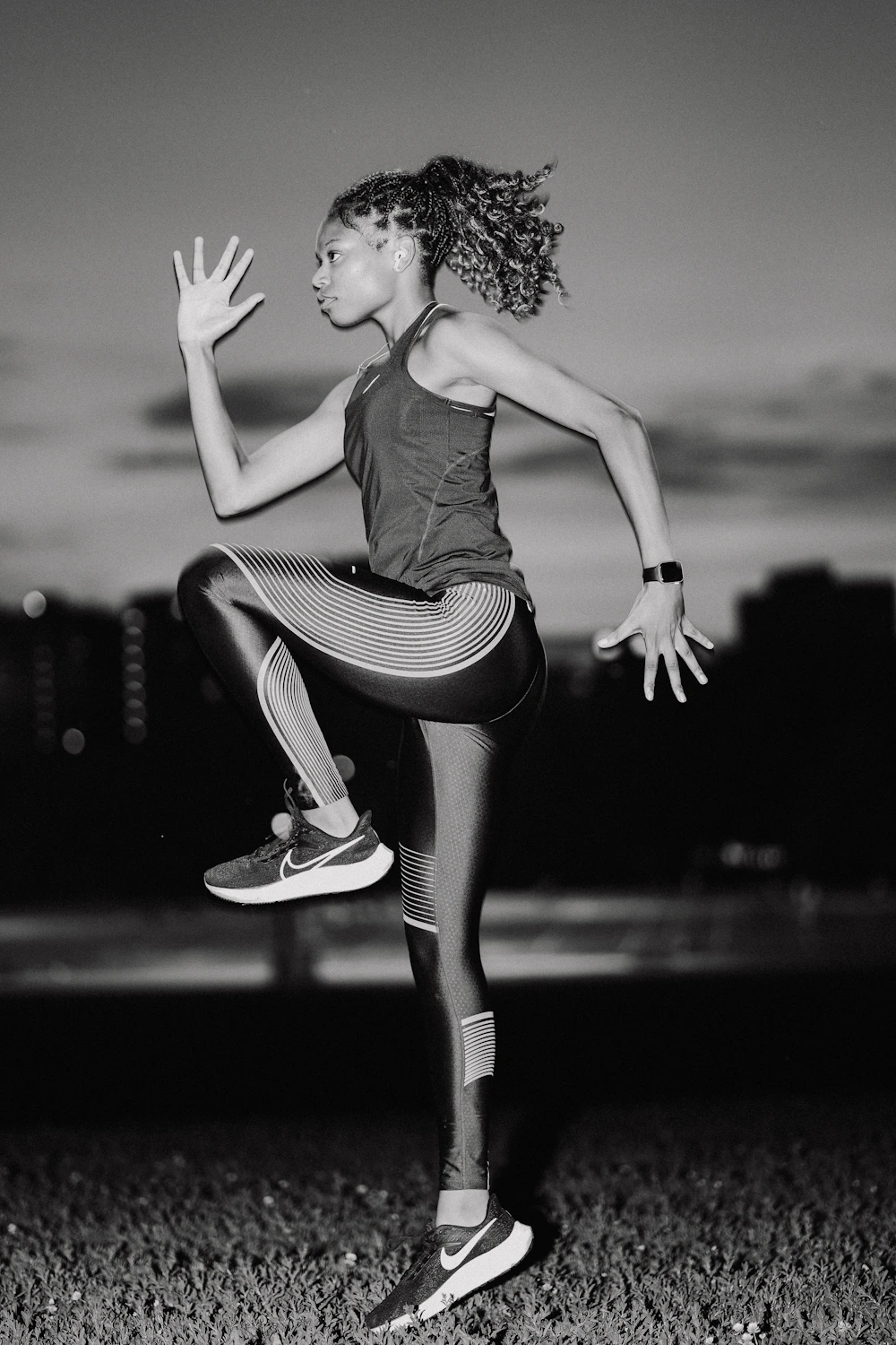 A Black woman running outdoors