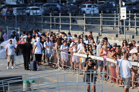 A crowd of people standing next to each other