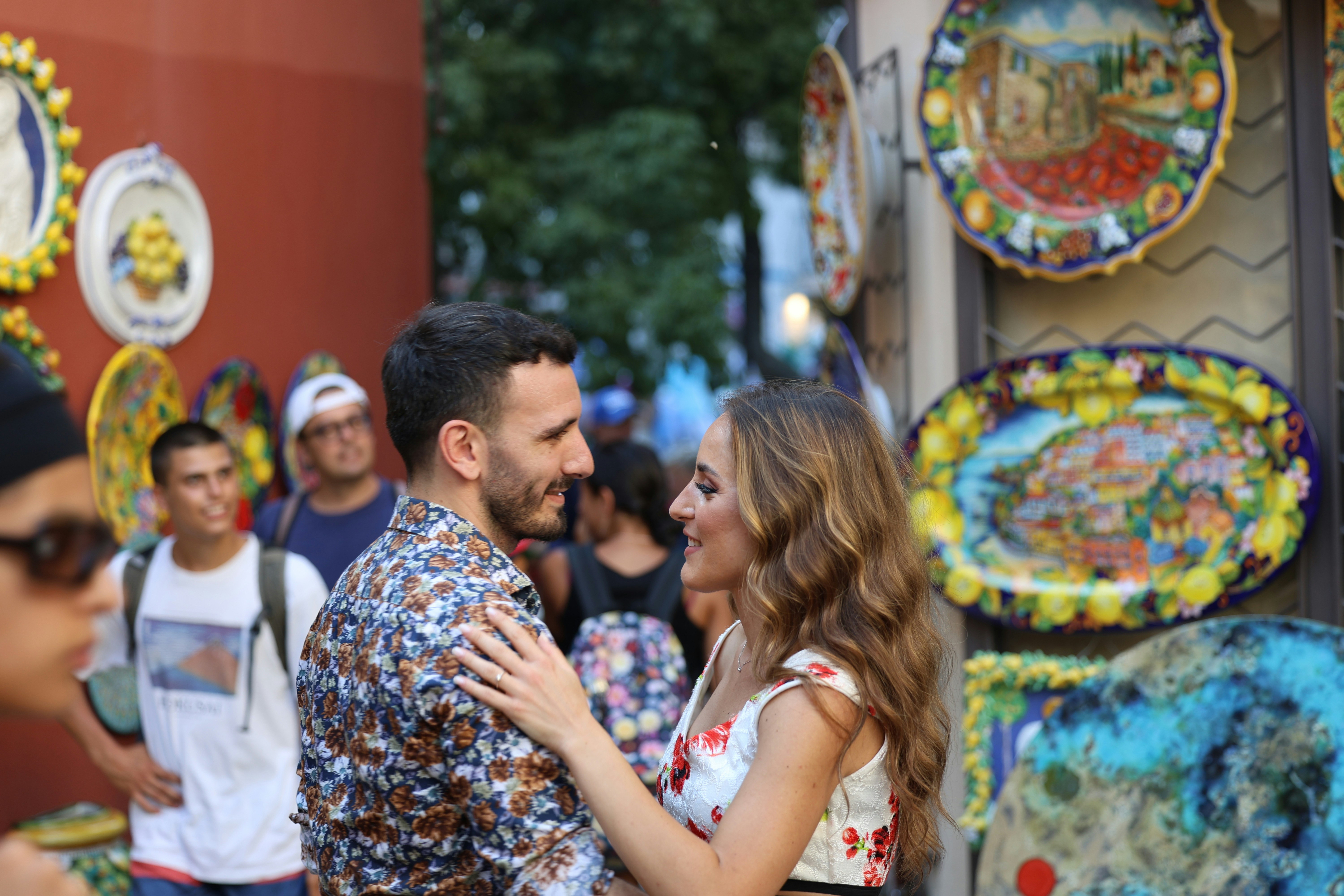A man and a woman standing next to each other