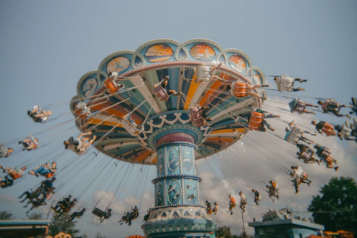 A carnival ride with people riding on it