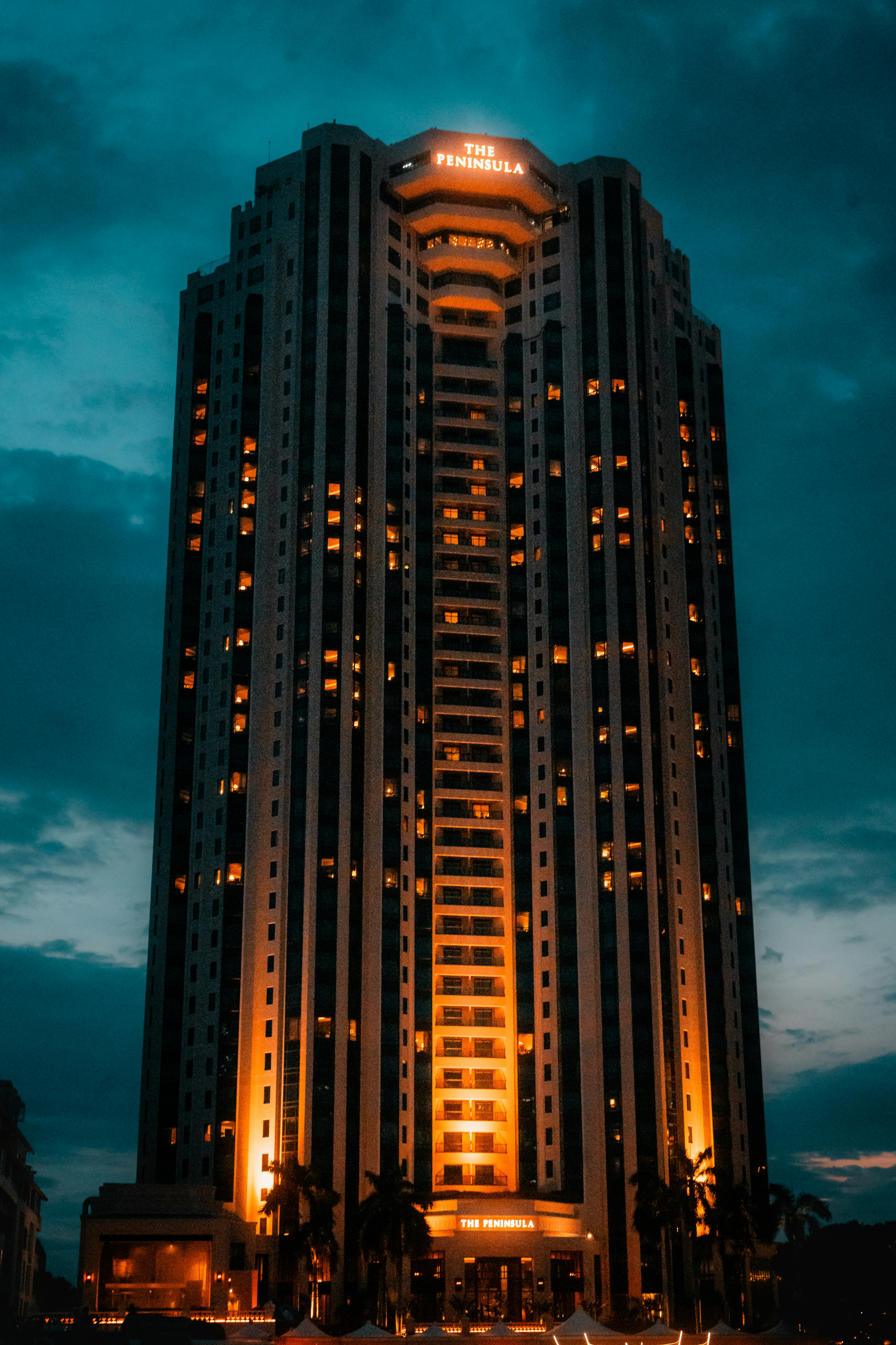 A very tall building with a lot of lights on it