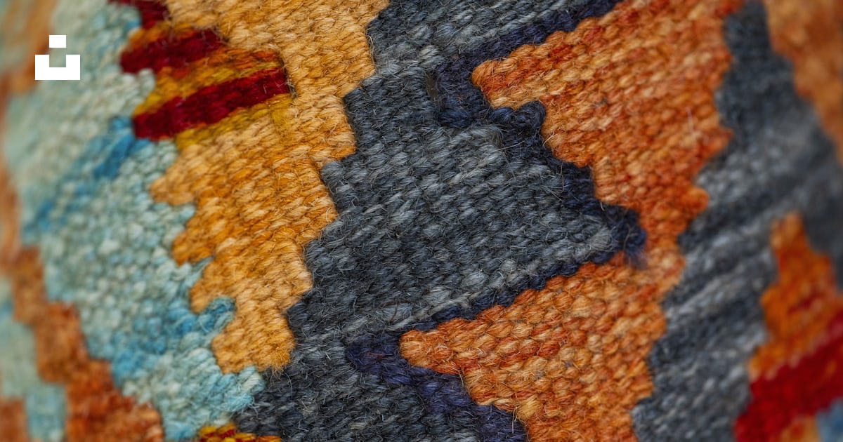 A close up of a multi colored rug photo – Free Rug Image on Unsplash