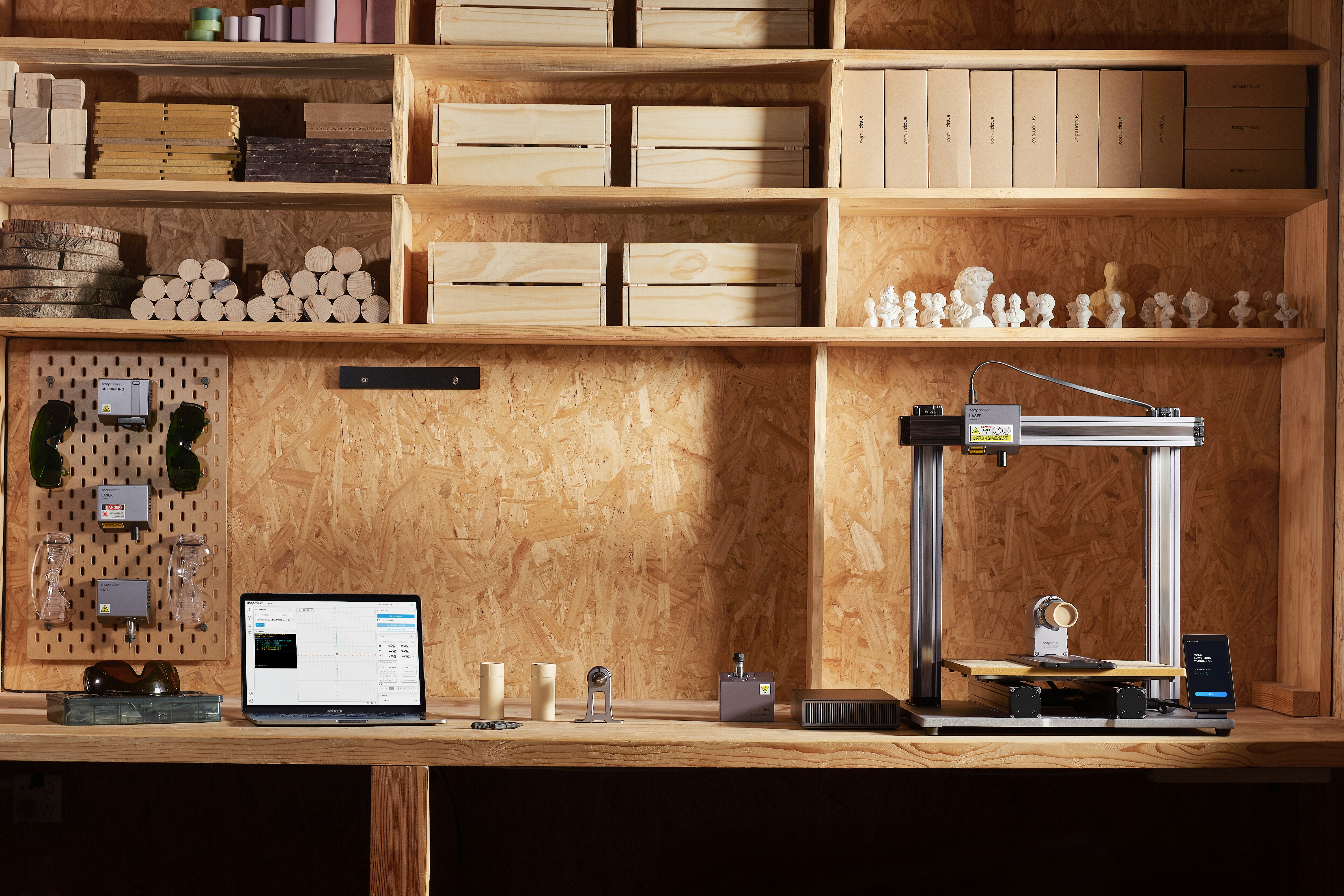 A desk with a laptop on it in a room