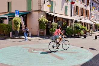 A person riding a bike on a city street