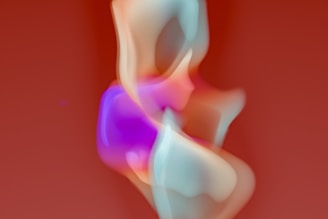 A blurry image of a woman in a dress