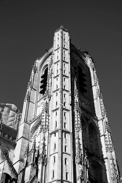 A black and white photo of a tall building