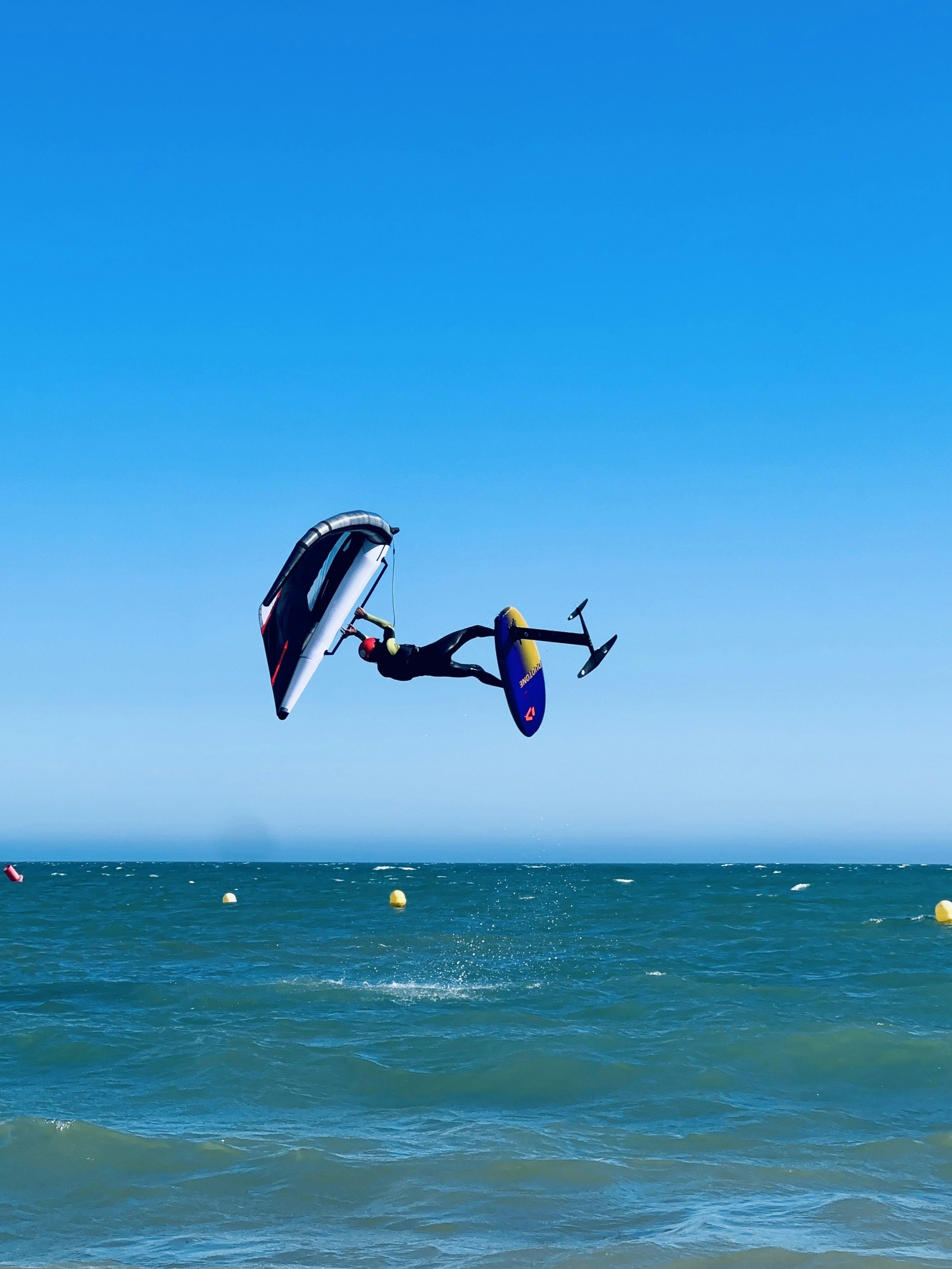 A person is para sailing in the ocean