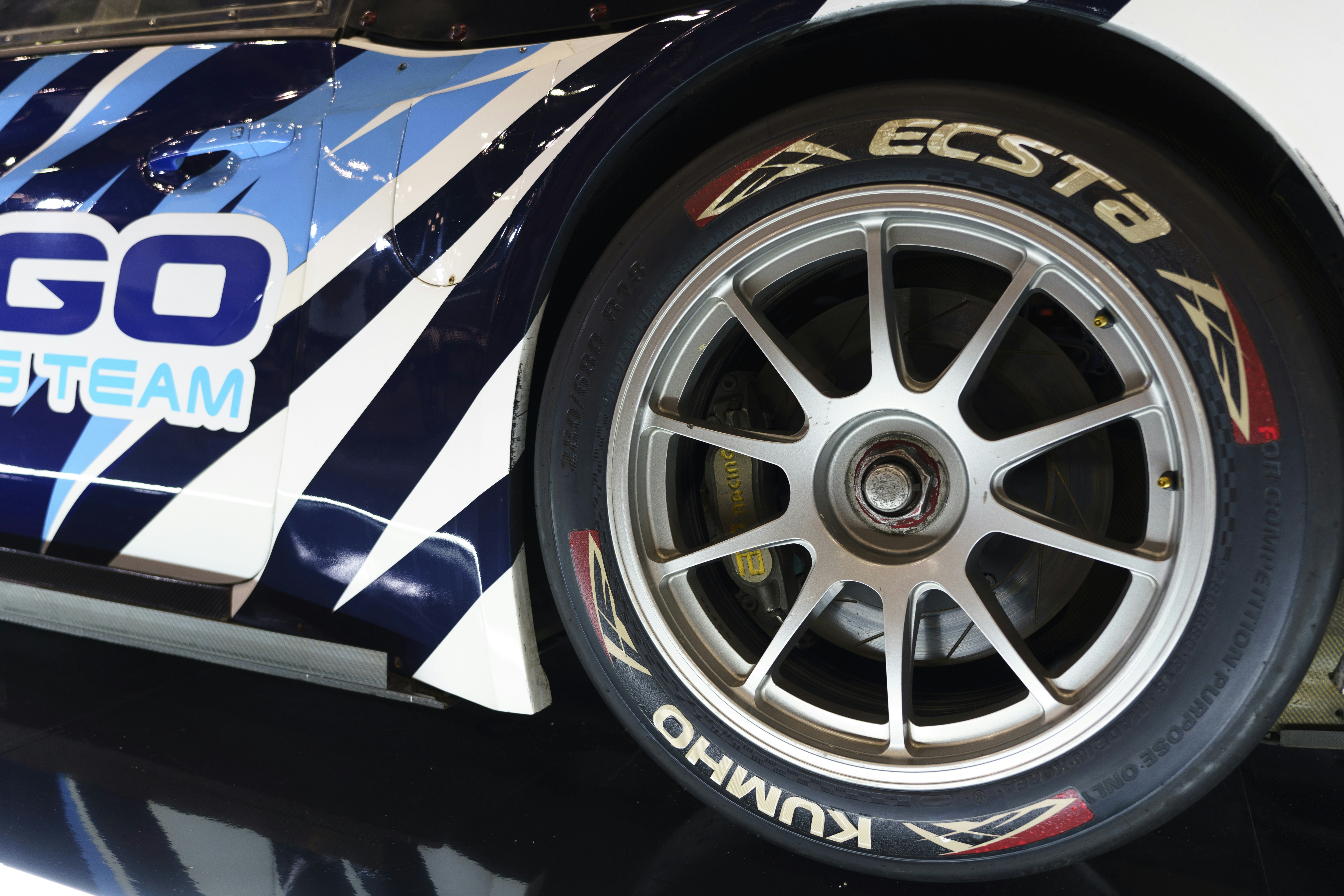 woman wearing yellow long-sleeved dress under white clouds and blue sky during daytime