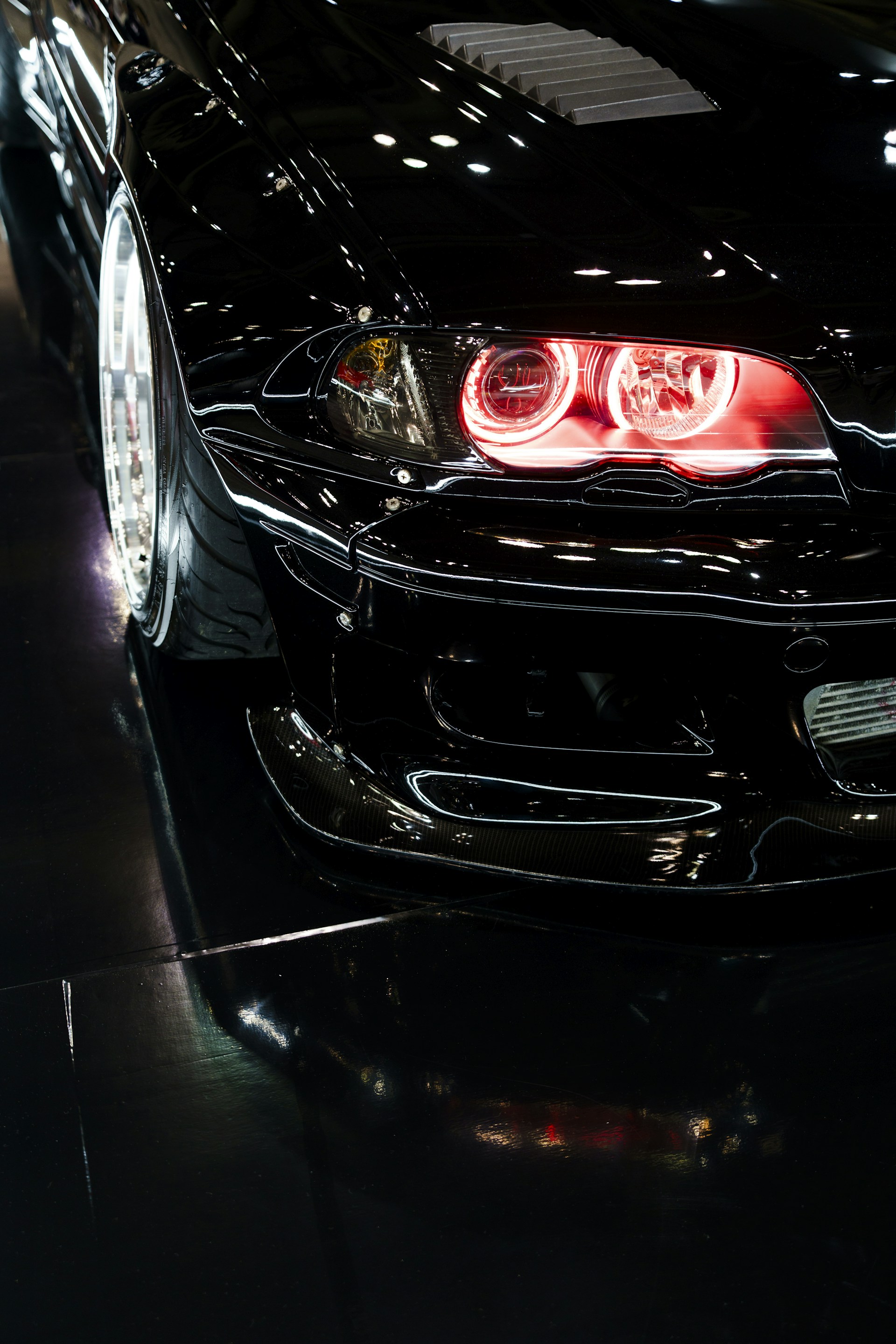 A close up of a car on a showroom floor