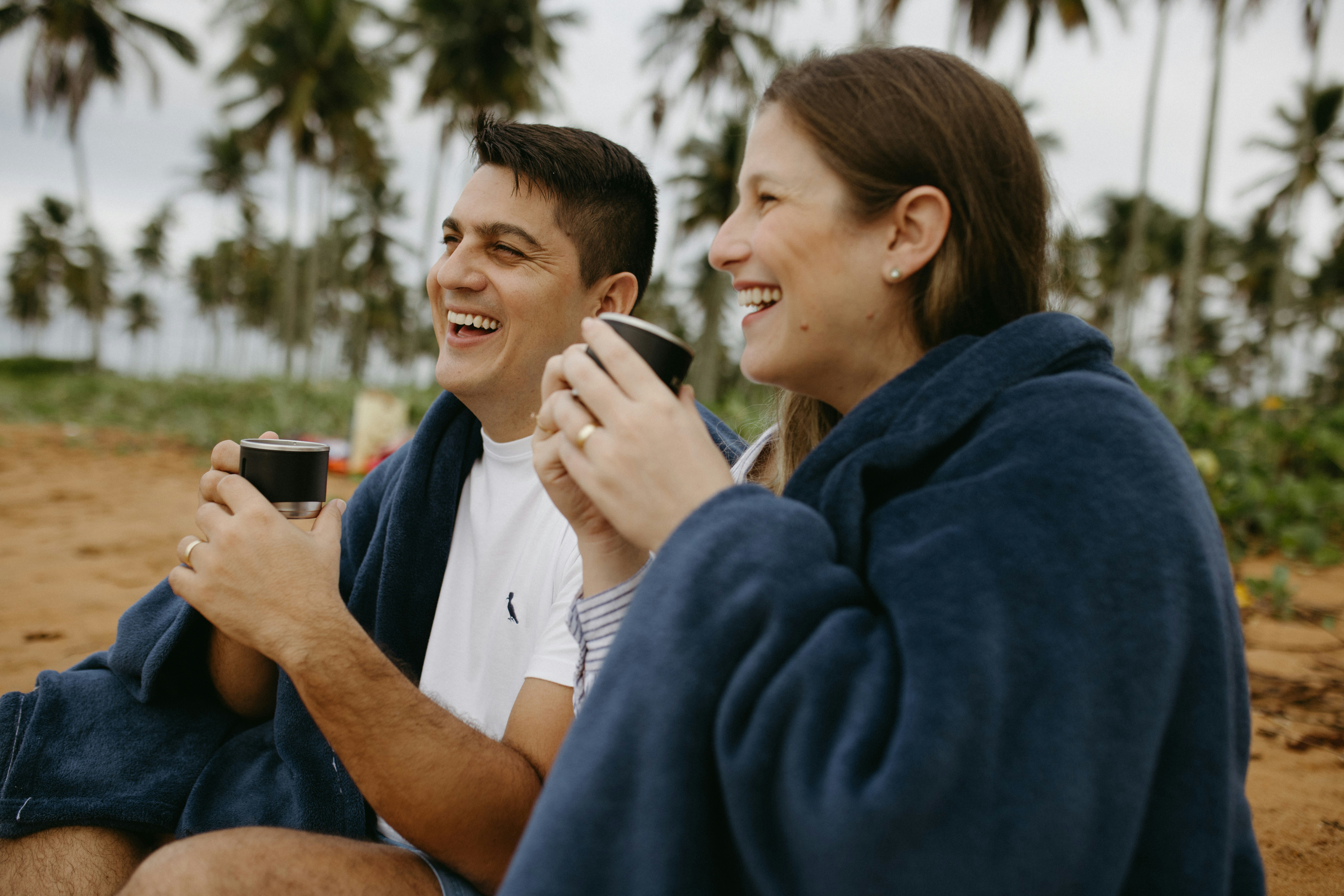 Smiling couple celebrating improved credit score
