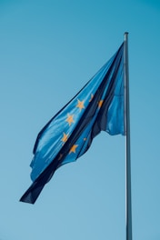 A european flag flying high in the sky