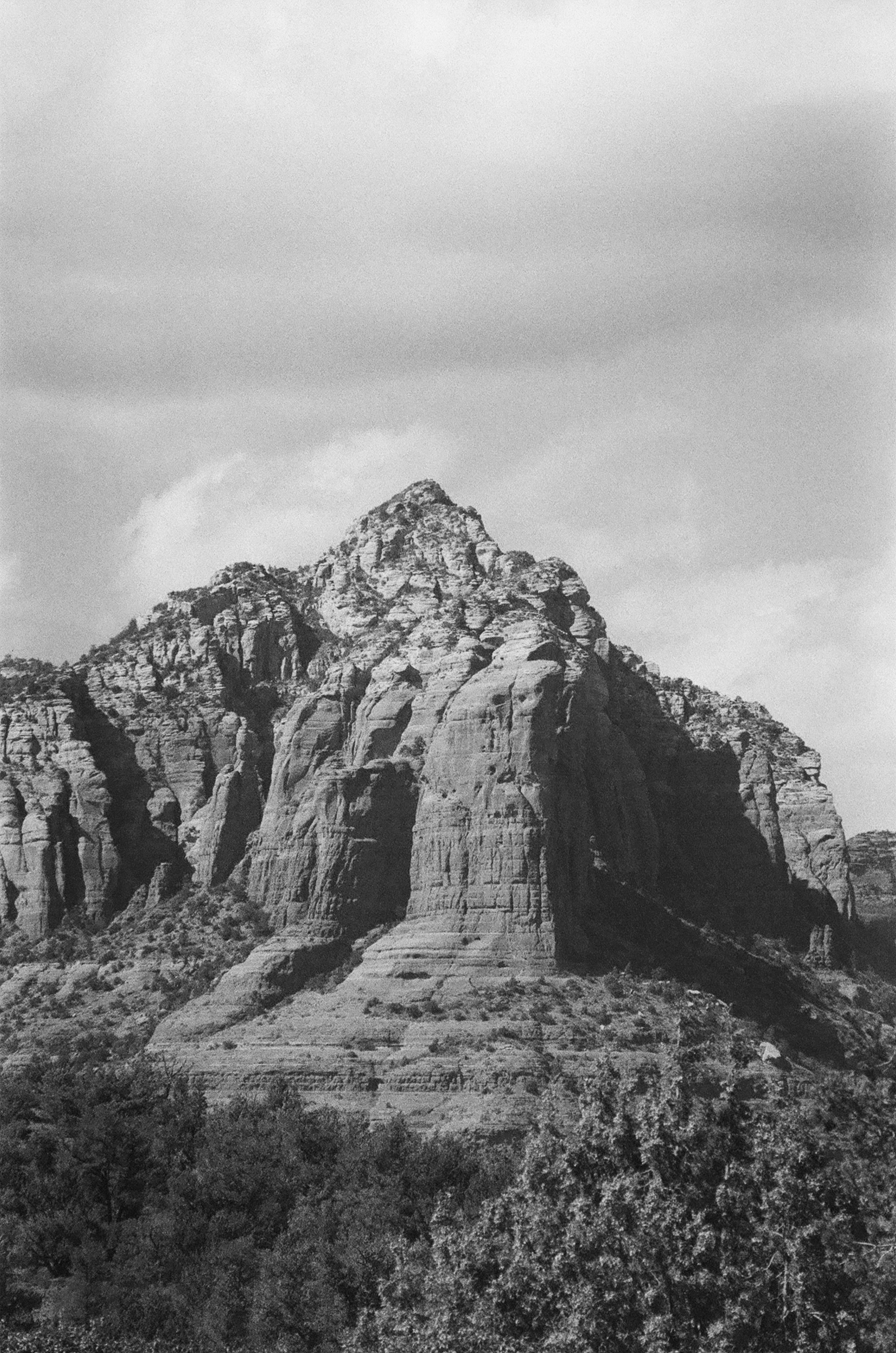 A black and white photo of a mountain