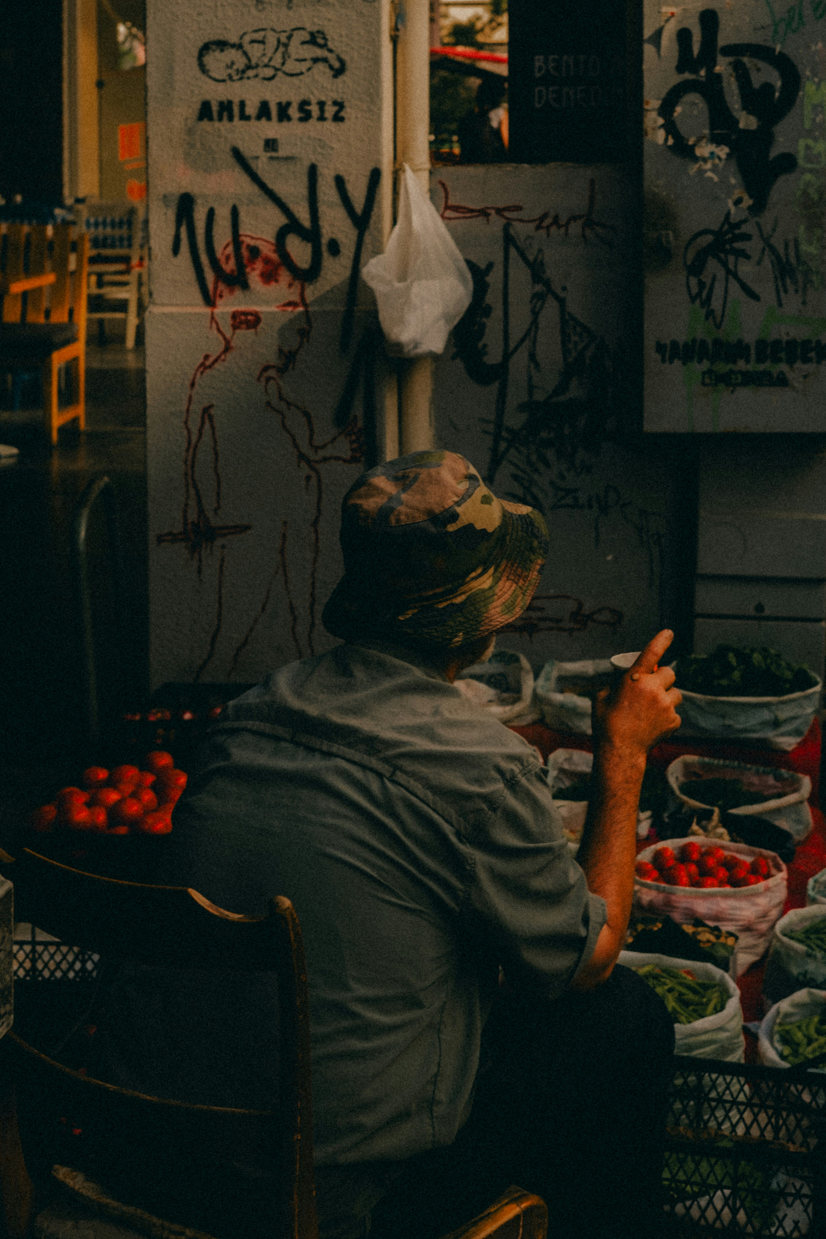 Image of a person cleaning a salad bar refrigerator with a seamless interior