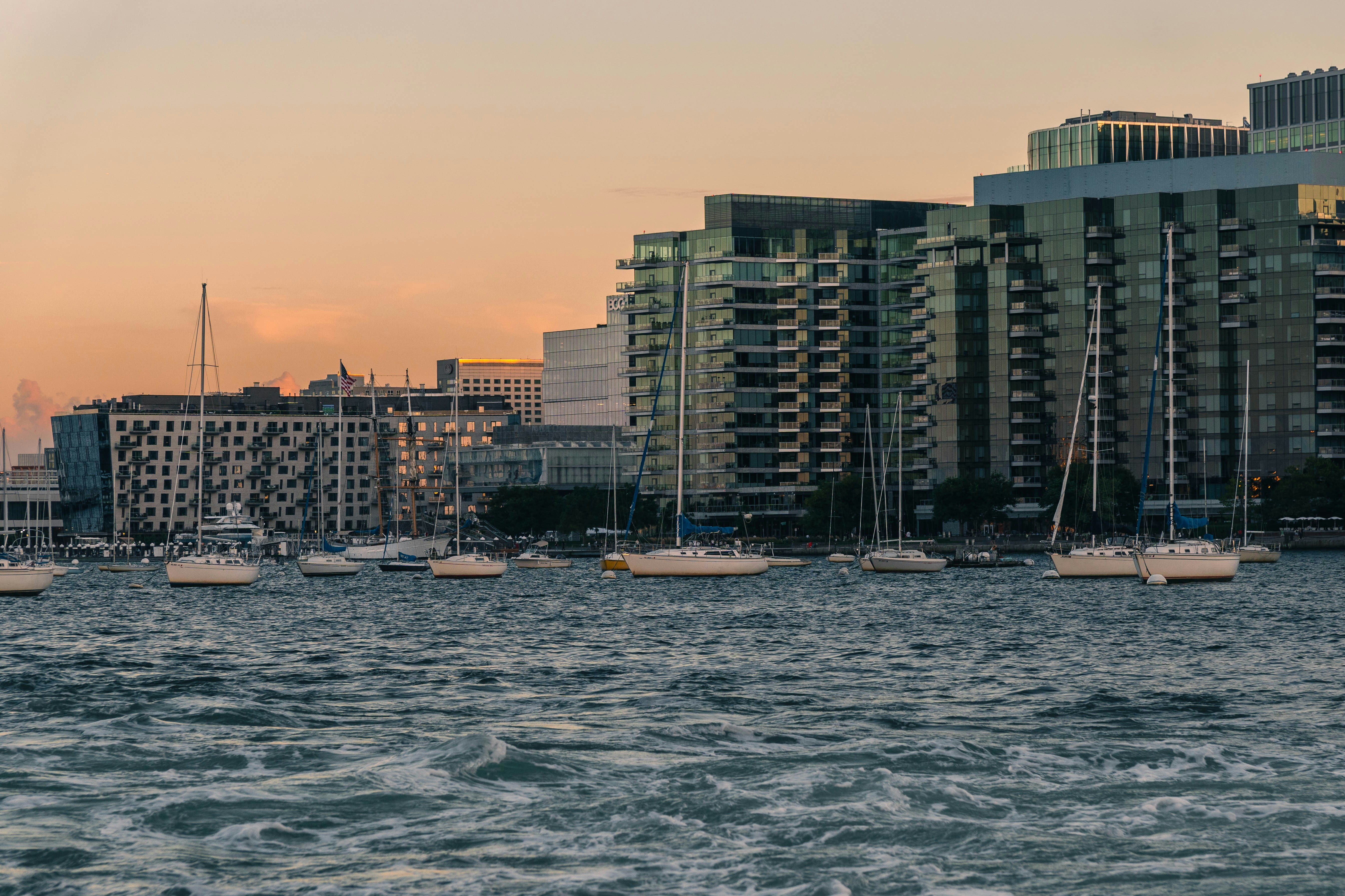 A large body of water with a bunch of boats in it