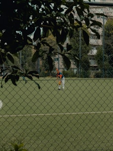 A group of people playing a game of soccer