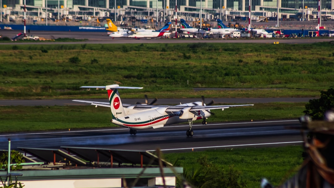 An airplane on the runway at an airport, Akaash Tori S2-AKE landing in VGHS airport.