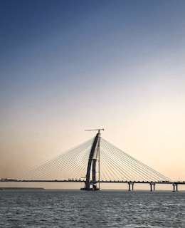 A large bridge spanning over a large body of water
