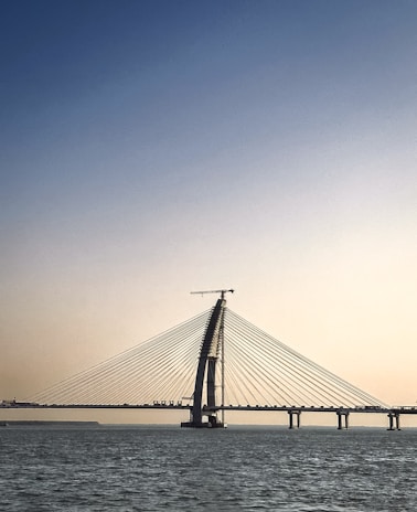 A large bridge spanning over a large body of water