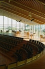 A large room with a lot of chairs inside of it