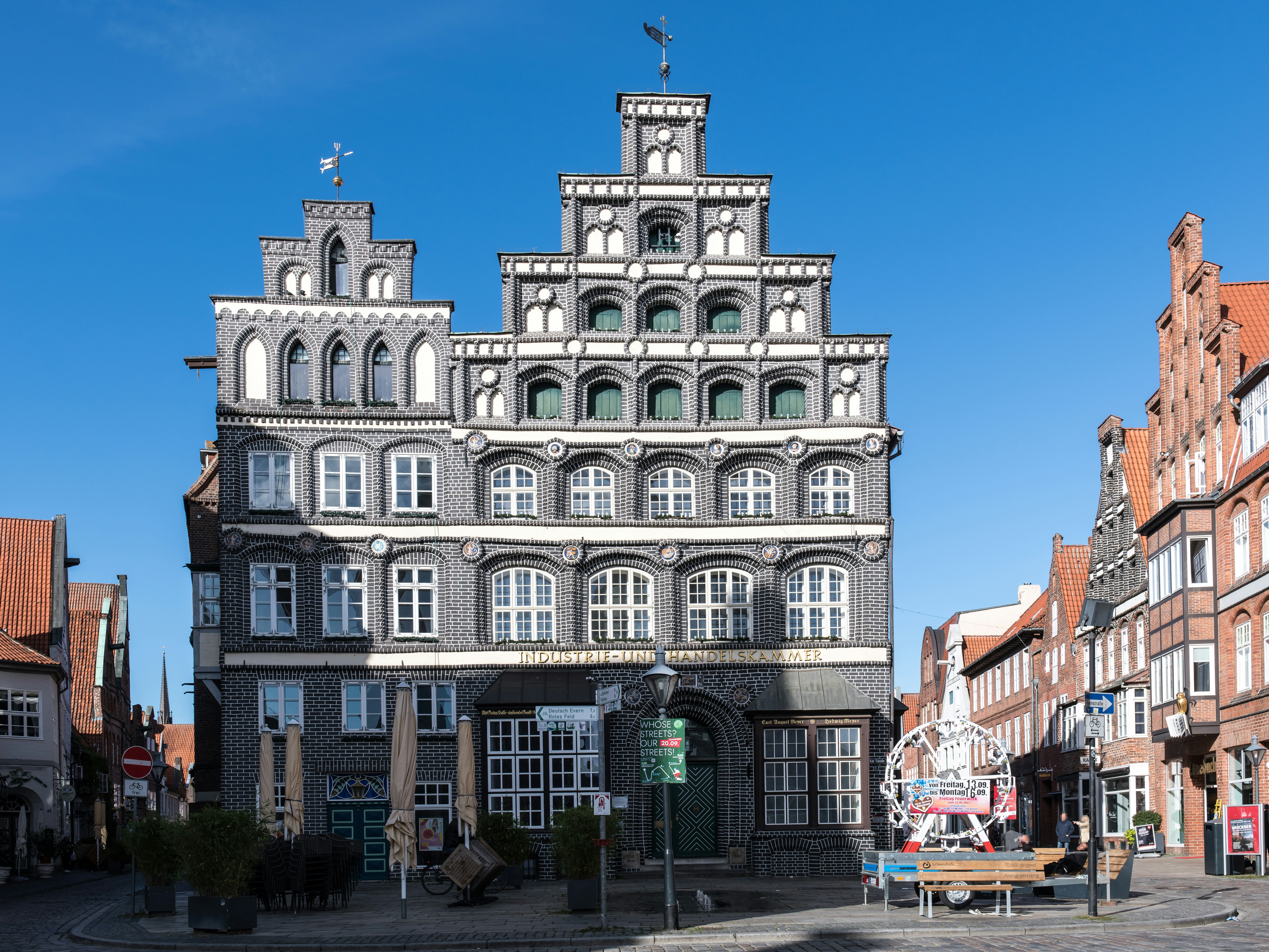 A large building with many windows on the top of it