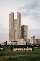 A city skyline with tall buildings in the foreground