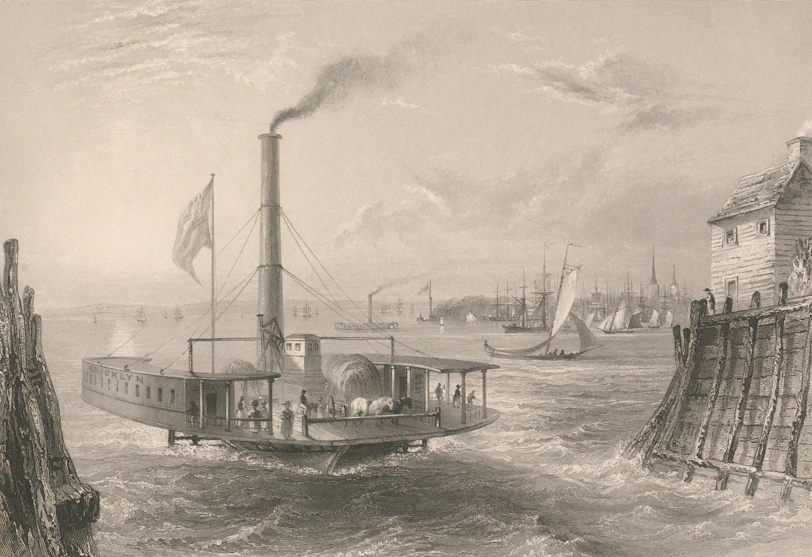 Paddle steamer sailing on a river with cityscape background buildings.
