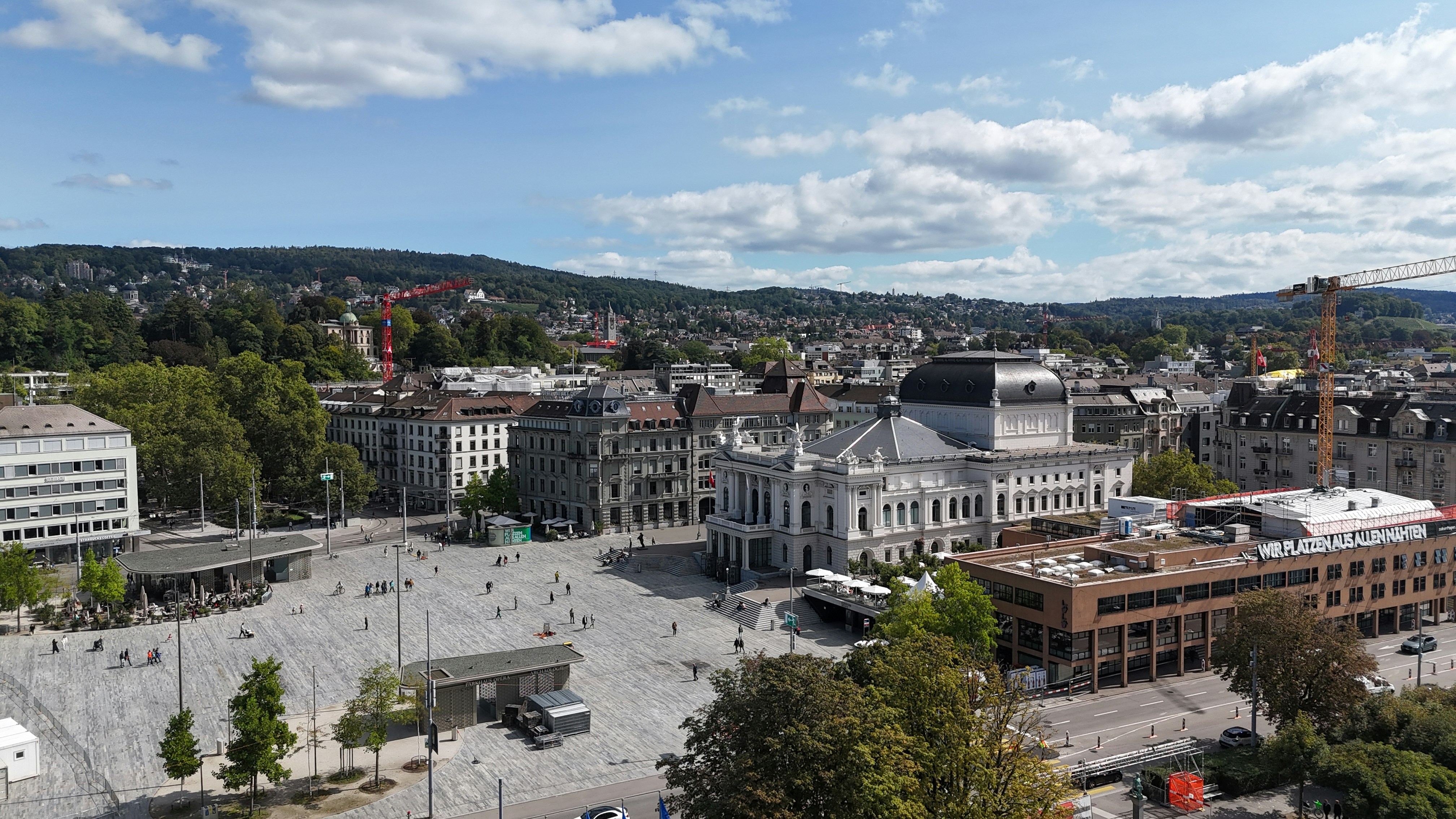 An aerial view of a city with a lot of buildings