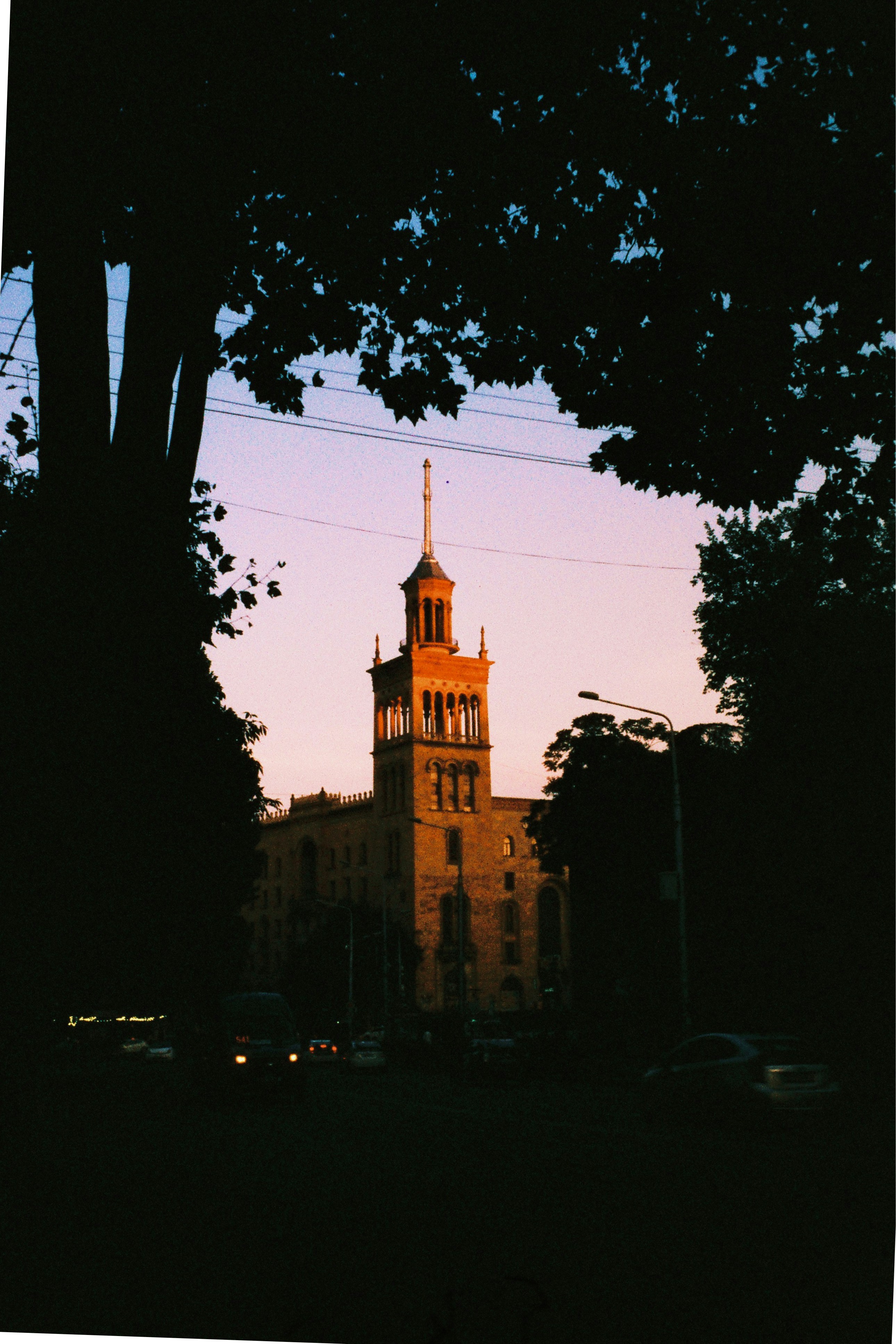 A tall building with a clock on the top of it