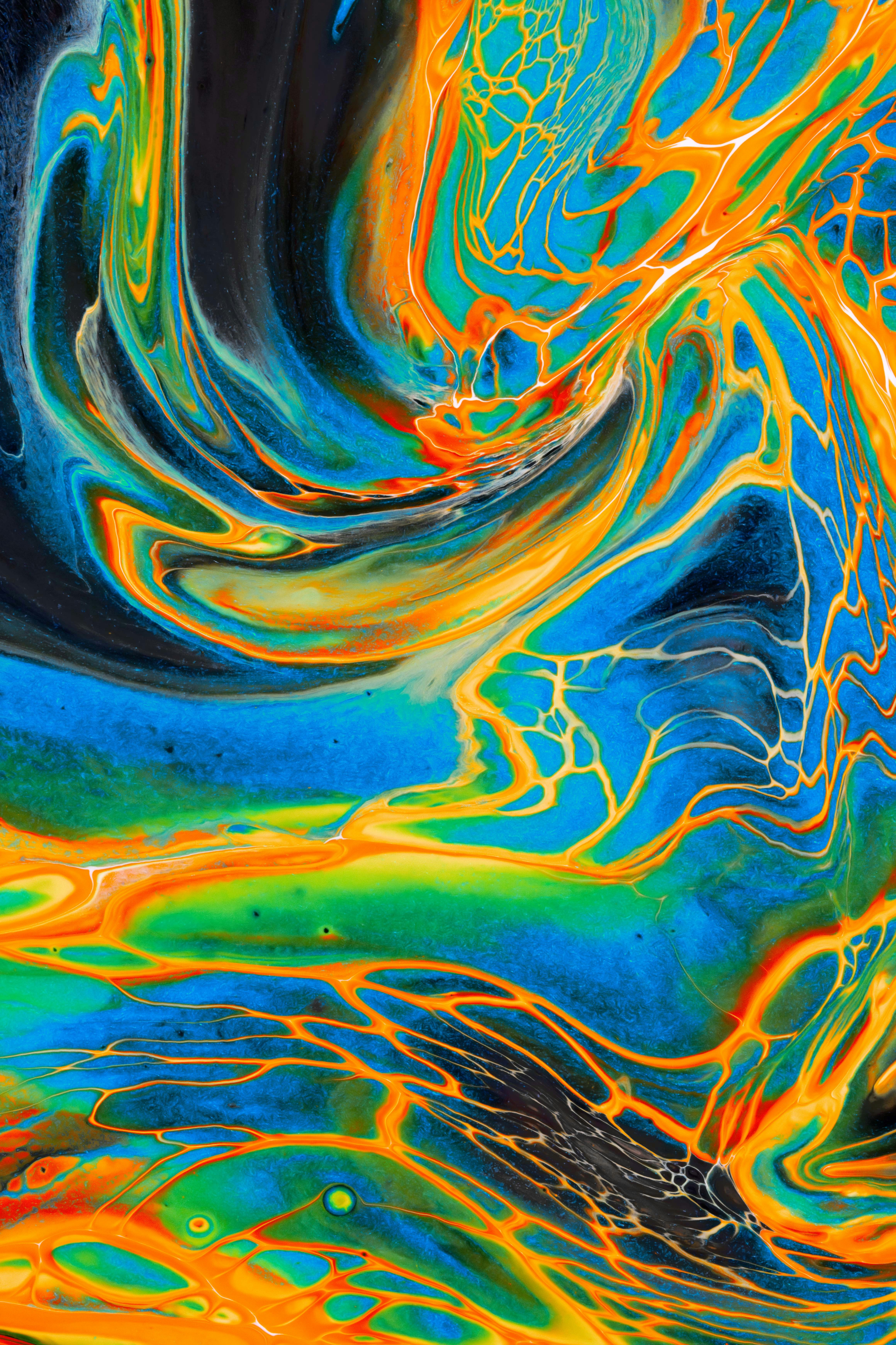 An abstract painting of blue, orange, and yellow colors