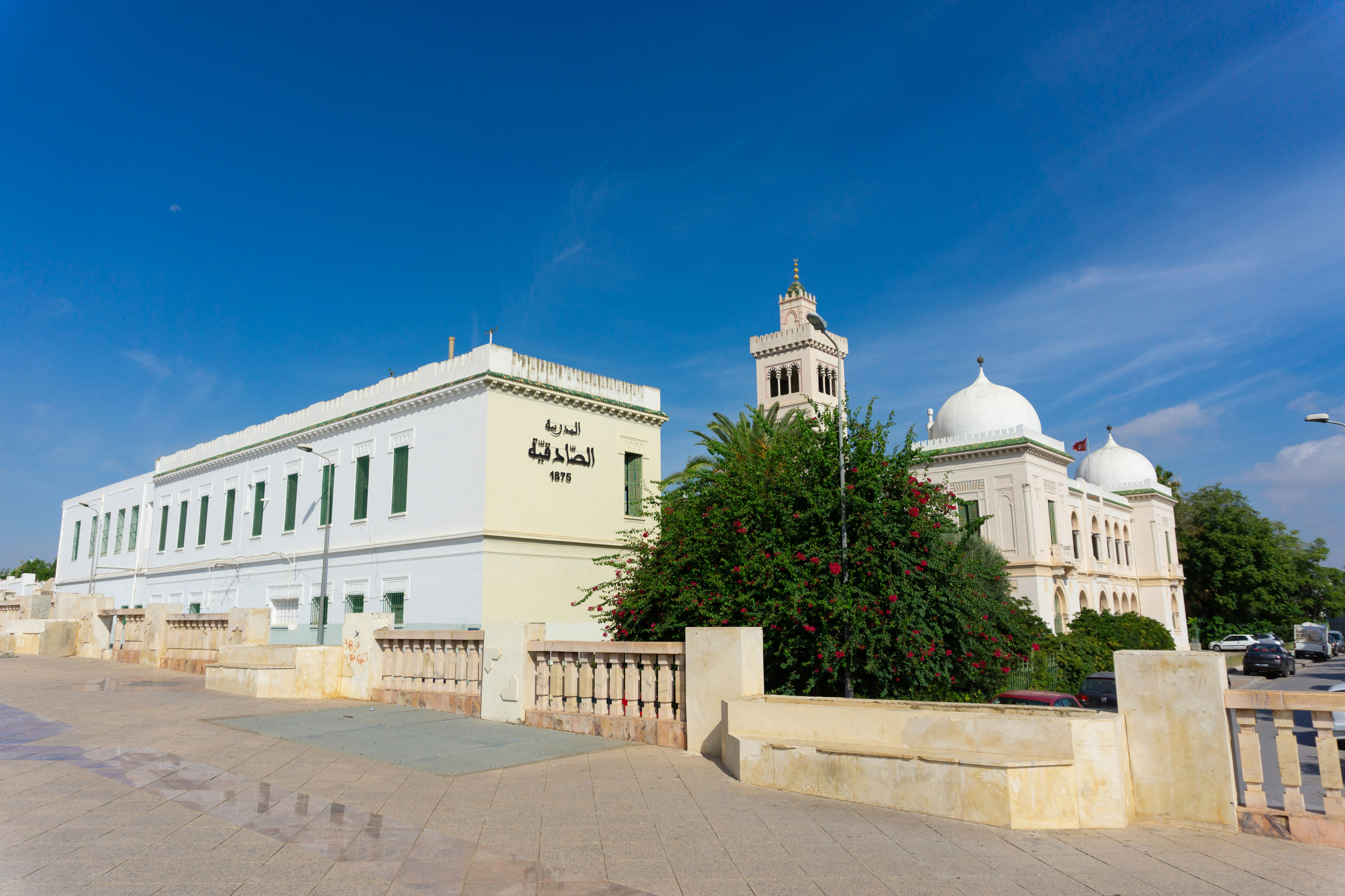 A large white building with a clock tower