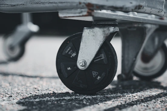 A close up of a skateboard on the ground