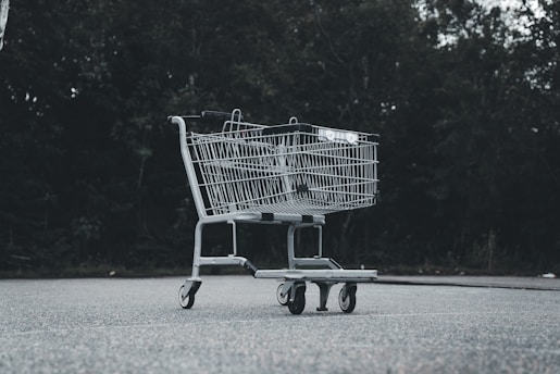 A black and white photo of a shopping cart