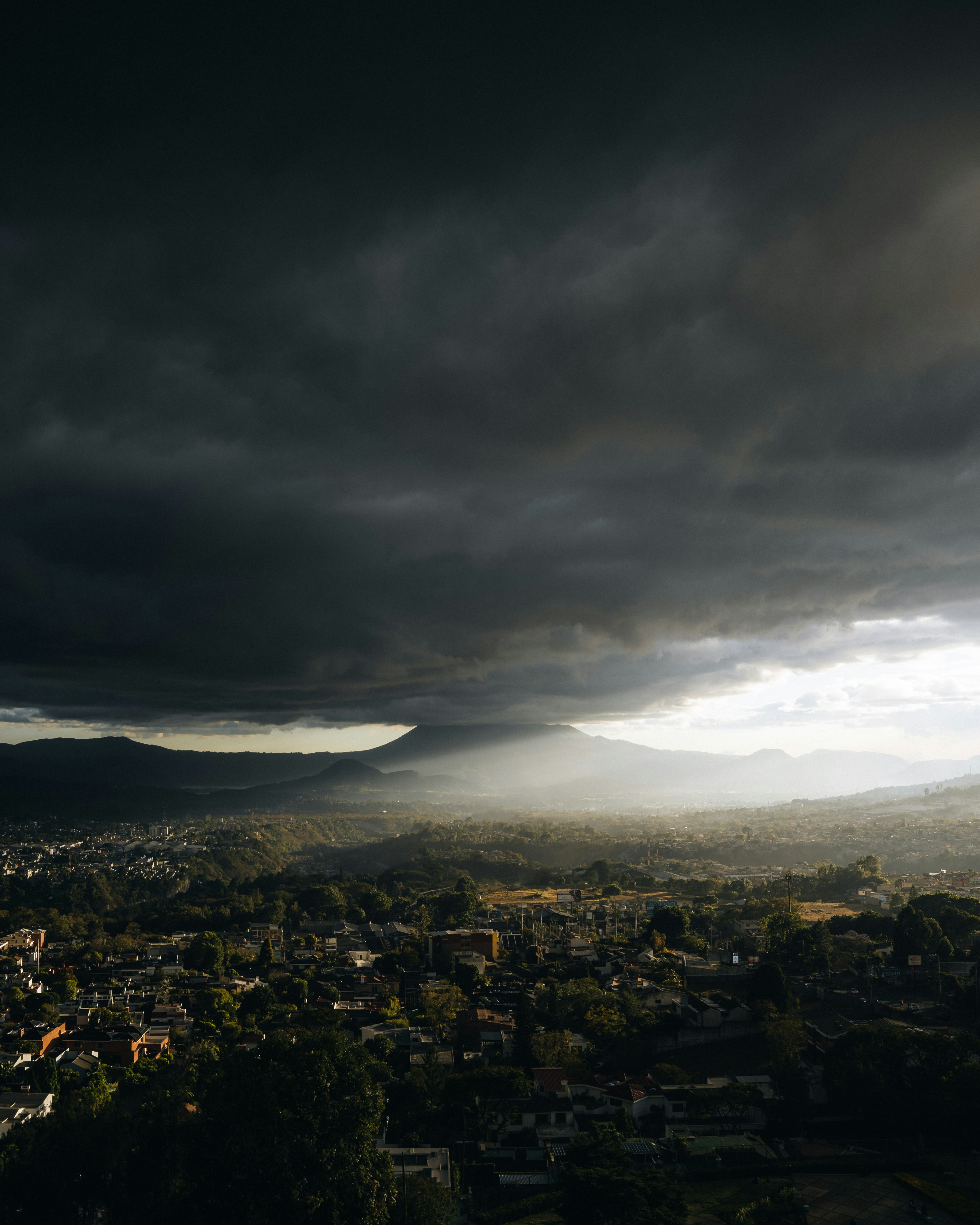 A view of a city under a cloudy sky