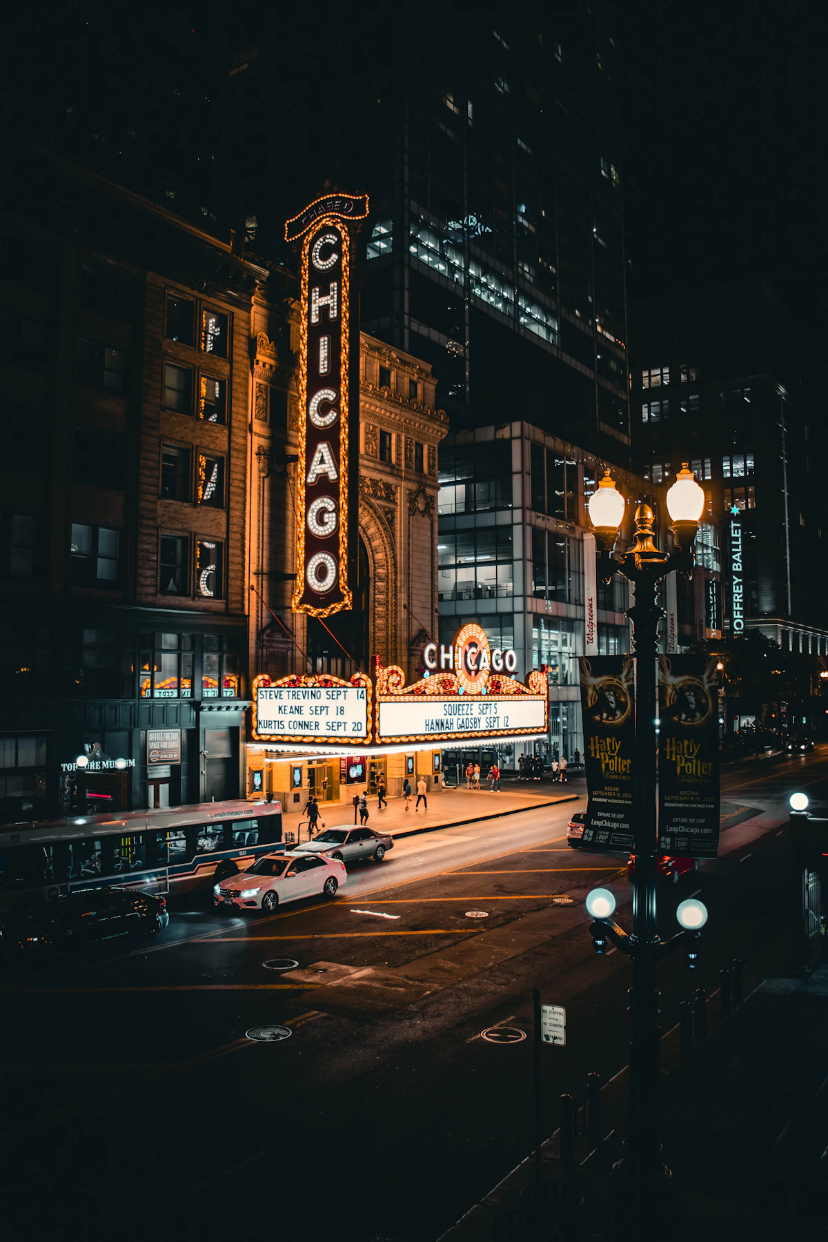 Chicago Theatre marquee above State Street at night