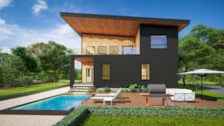 A modern house with a pool in front of it