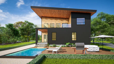 A modern house with a pool in front of it