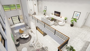 An aerial view of a living room and dining room