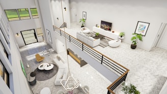 An aerial view of a living room and dining room