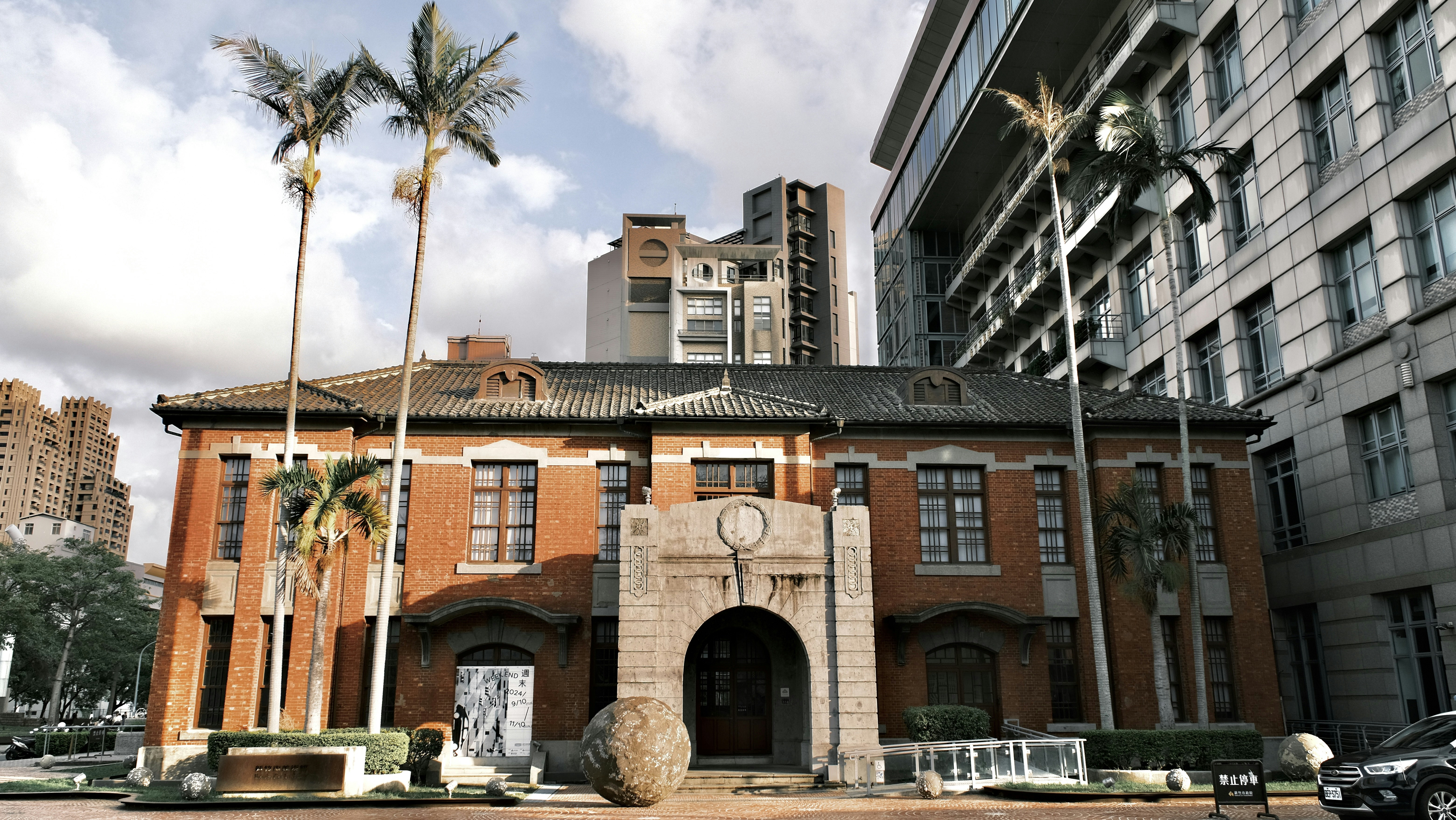 A large building with a clock on the front of it