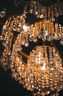 A chandelier hanging from a ceiling in a room