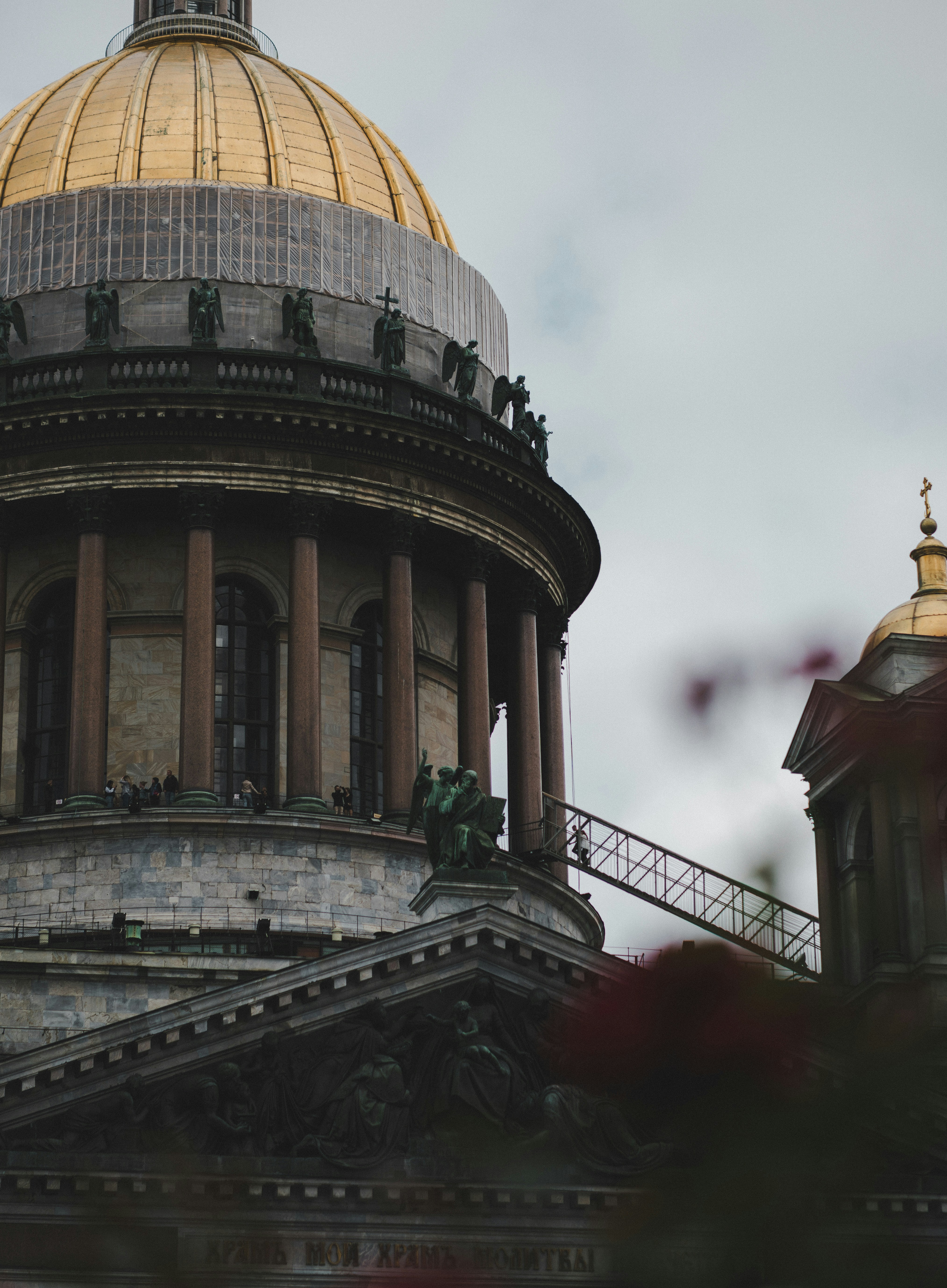 The dome of a building with a clock on it