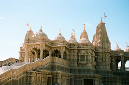 A group of people standing in front of a building