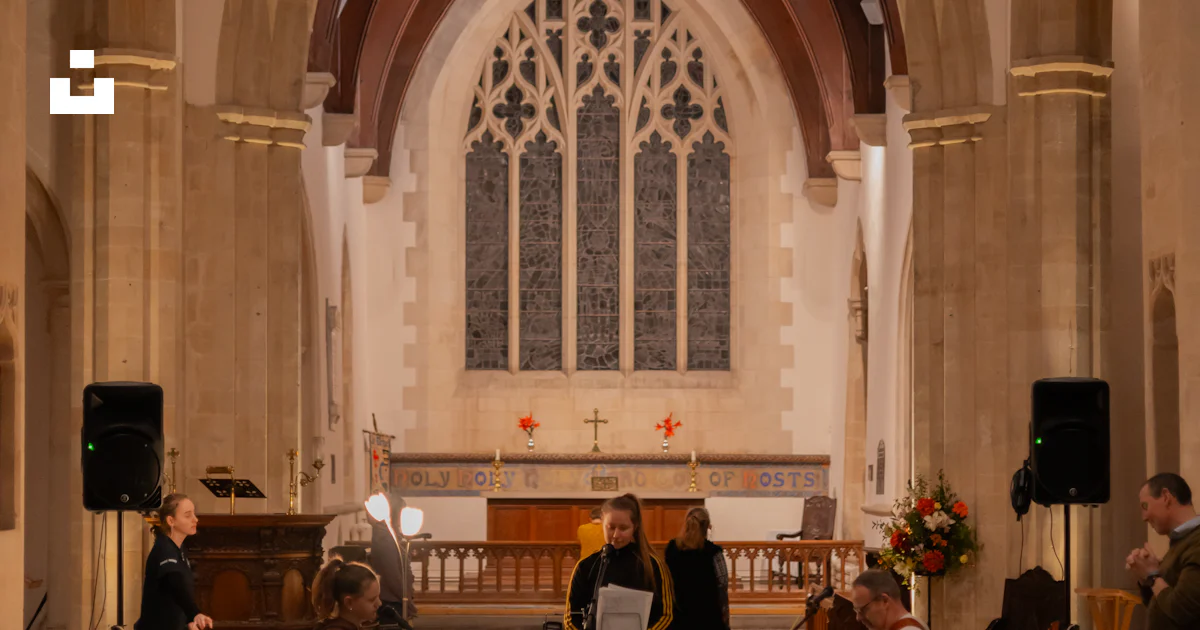 A group of people playing instruments in a church photo – Free Woman ...
