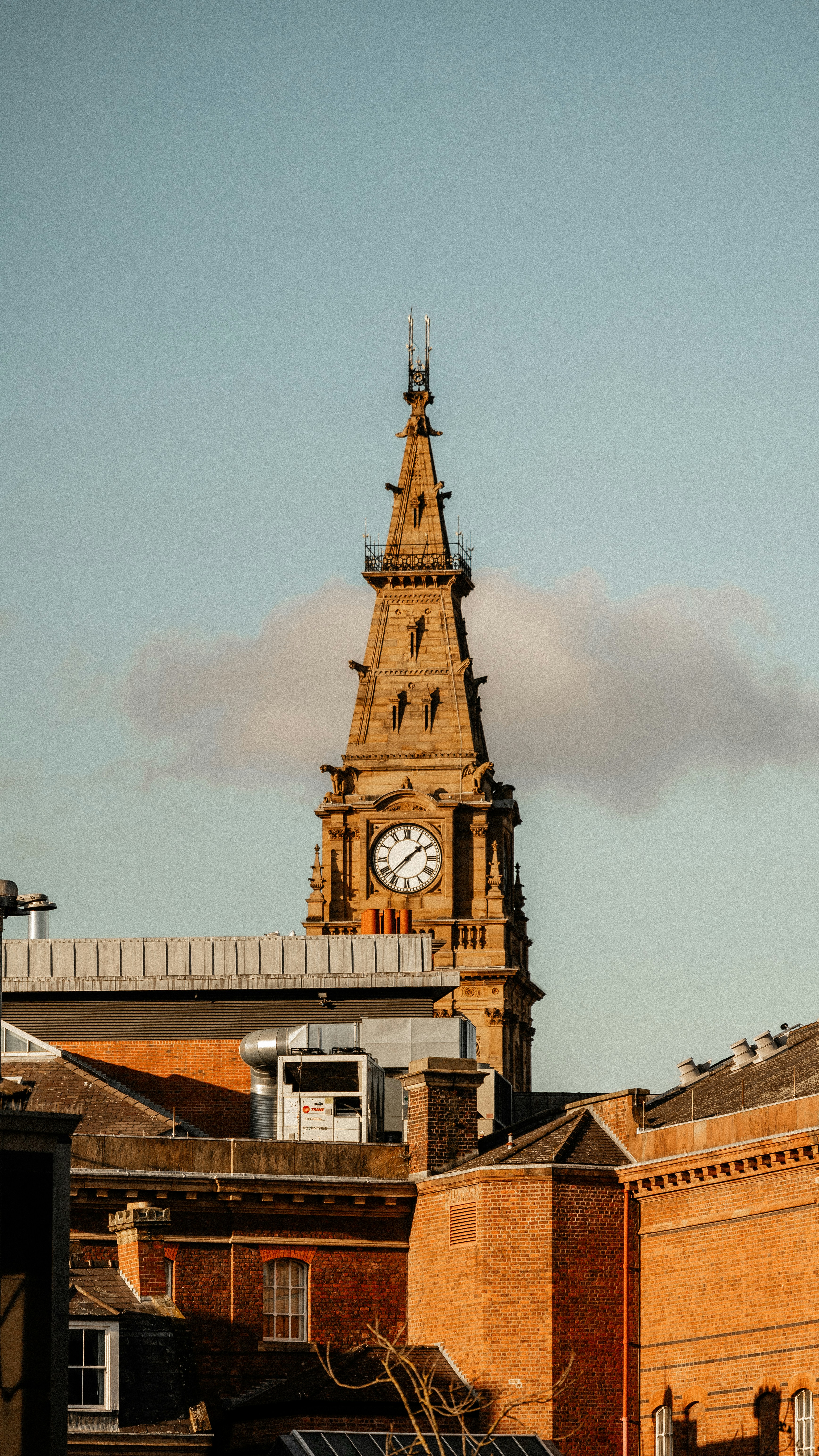 A tall clock tower towering over a city