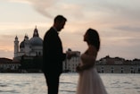 A man and a woman standing next to each other