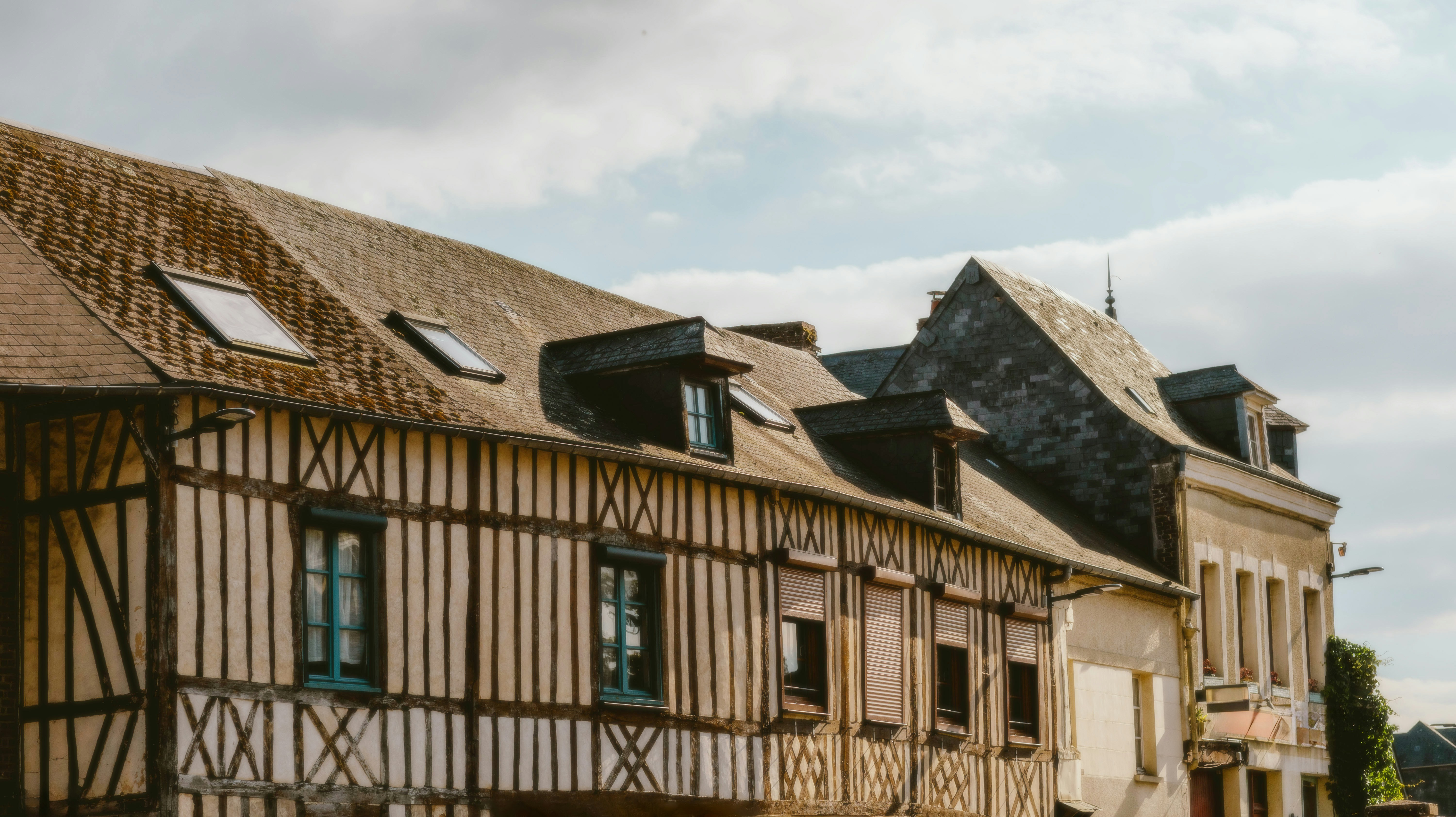 A row of old wooden buildings on a street