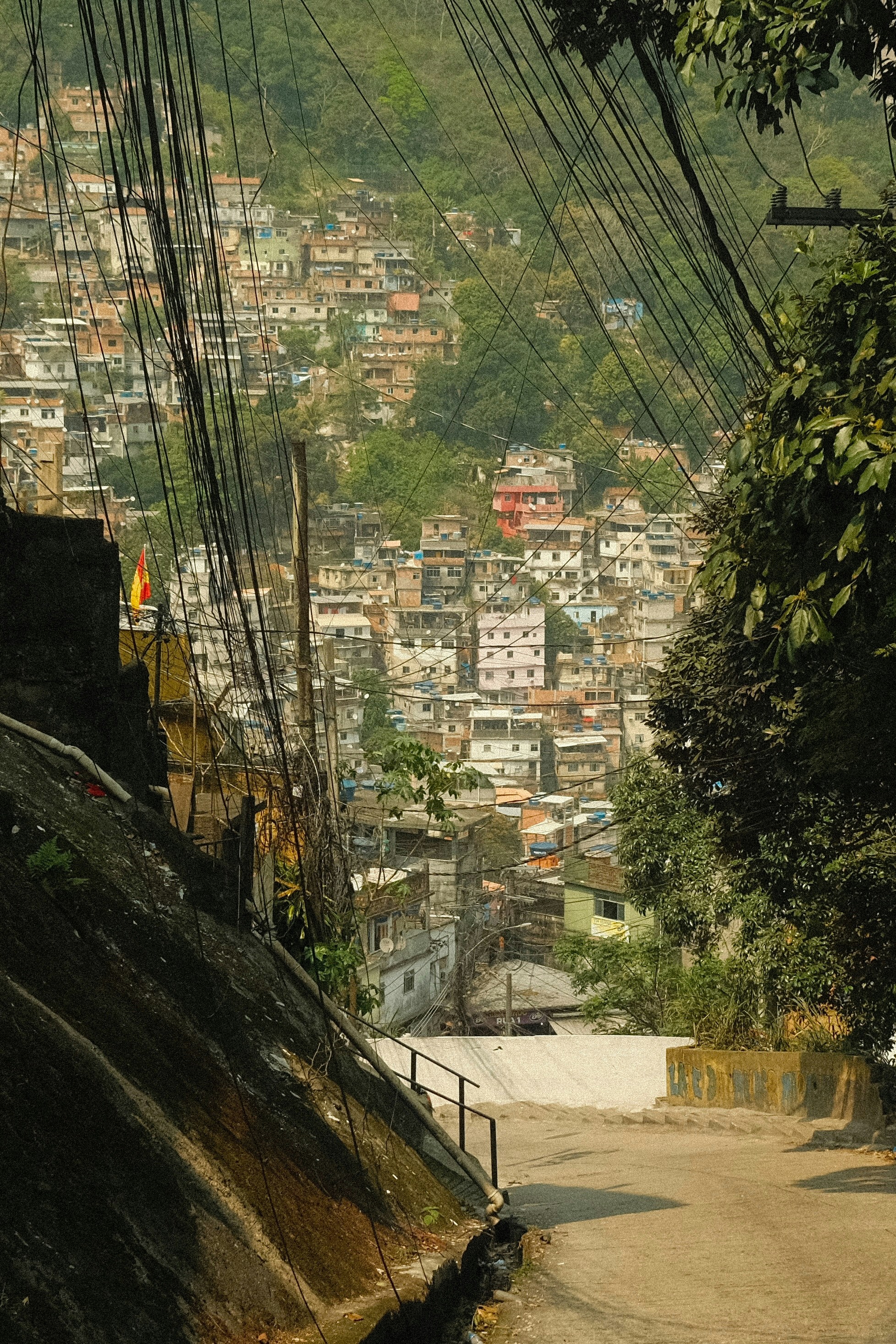 A person riding a bike down a dirt road
