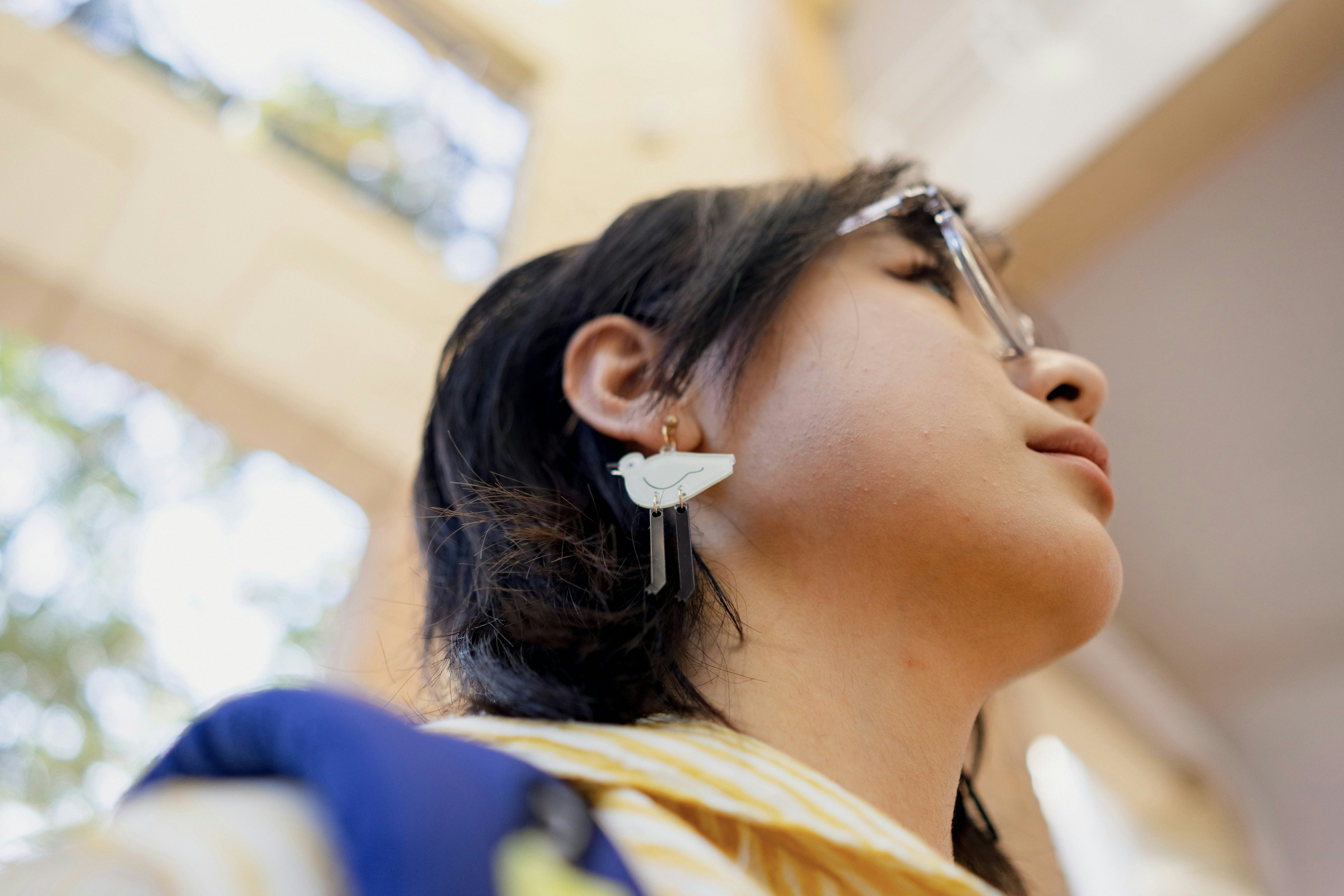 A woman with her eyes closed looking up photo – Free Face Image on Unsplash